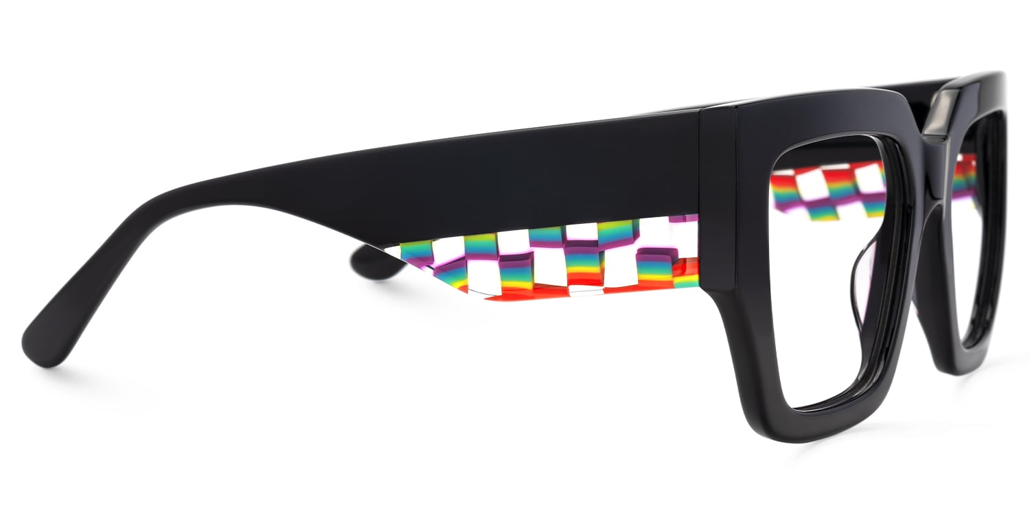 Lentes graduados unisex en acetato negro con diseño geométrico y detalles multicolor en las varillas interiores, una combinación de elegancia contemporánea y estilo creativo.