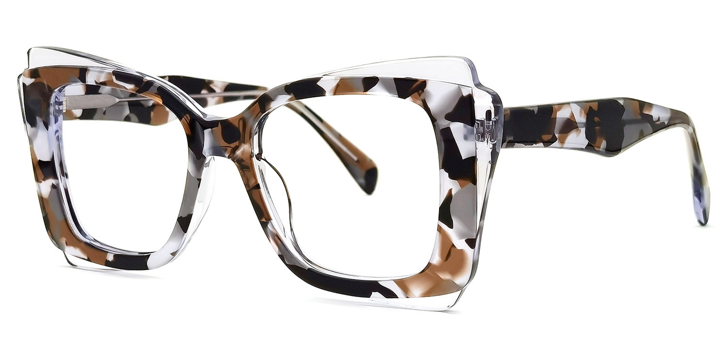 Lentes graduados tipo ojo de gato oversized en acetato translúcido marmoleado en tonos blanco, café y negro. Diseño moderno con efecto carey contemporáneo, ideal para un estilo elegante y vanguardista.