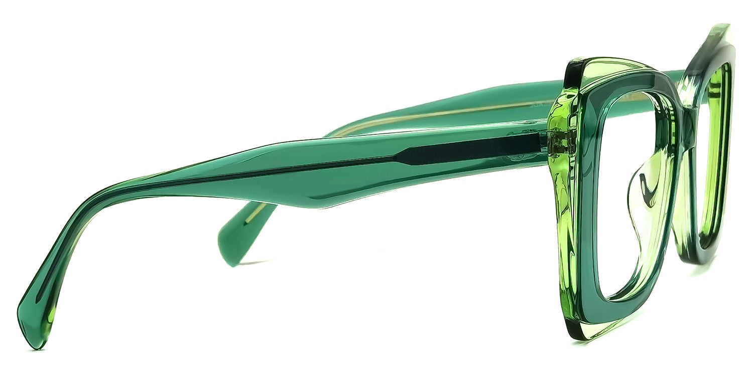 Lentes graduados cuadrados oversized en acetato translúcido verde esmeralda, con diseño moderno, estructura robusta y acabado transparente que aporta un estilo sofisticado y vanguardista.