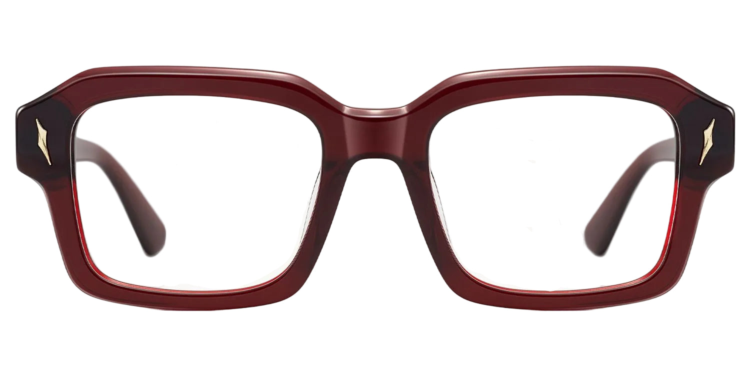 Lentes graduados rectangulares oversized en acetato color vino translúcido con varillas metálicas doradas y diseño moderno. Un armazón elegante, sofisticado y versátil para uso diario.