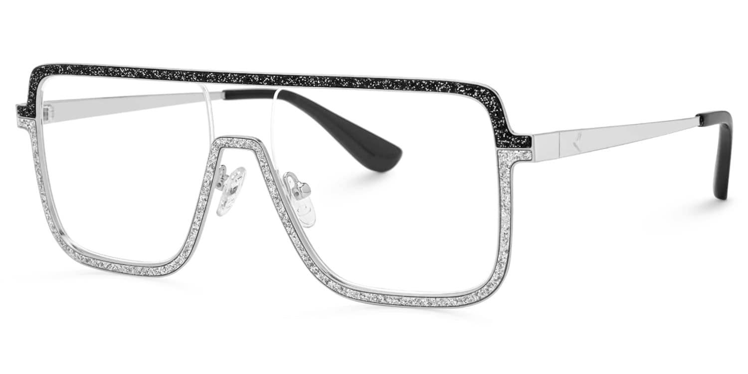 Lentes graduados oversized tipo visor en metal plateado con detalles de cristales brillantes y acentos negros. Diseño vanguardista, elegante y de inspiración lujo contemporáneo.